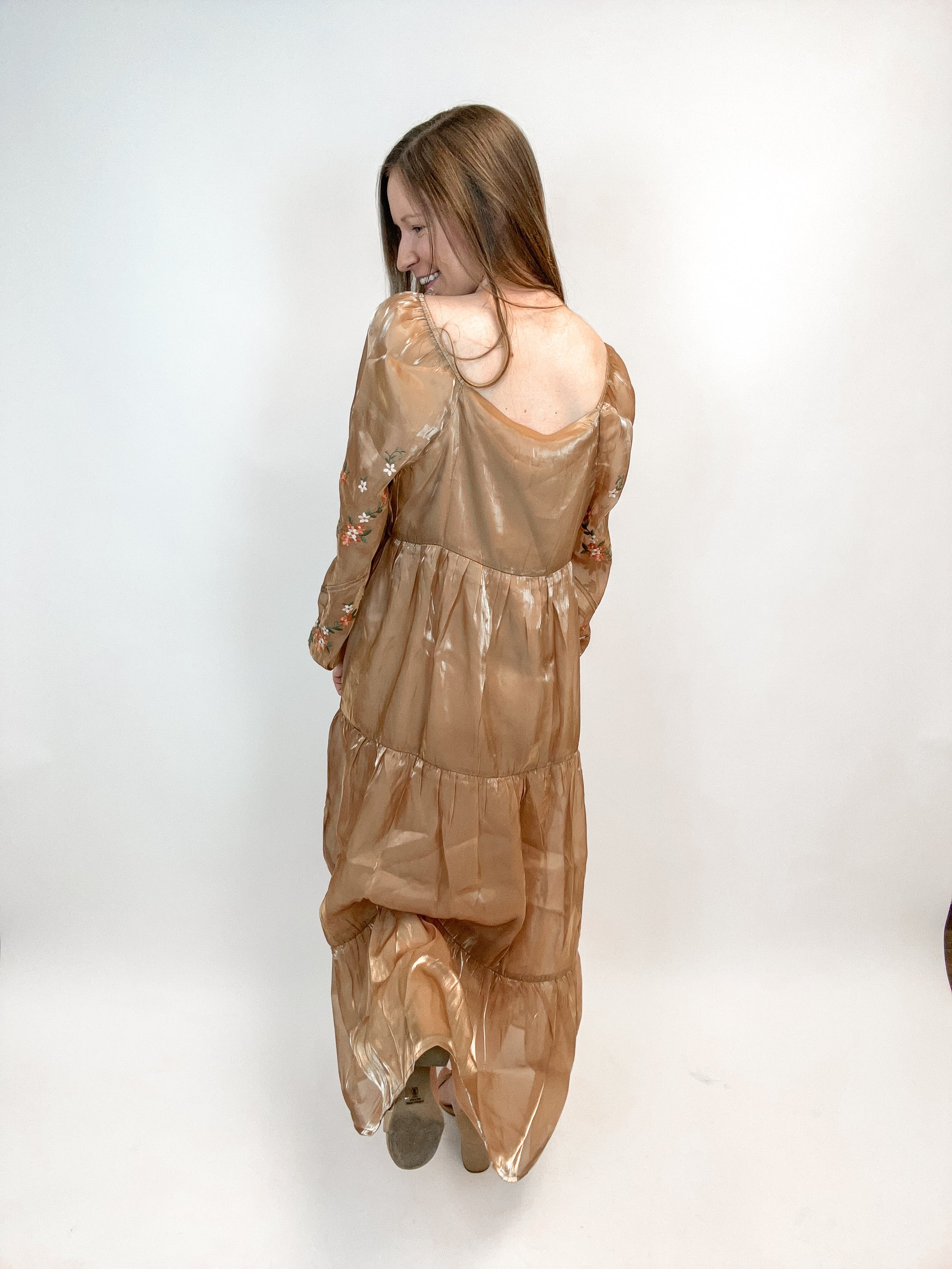 kendra embroidered dress The kind of dress that makes you pause, smile, and remember how good it feels to feel like you Our Kendra Embroidered Dress is crafted in delicate embroidered tulle with a smocked